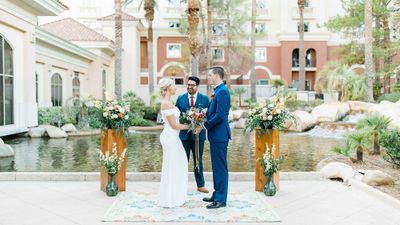 A couple marries at the JW Marriott Las Vegas. The property is offering a wedding package to celebrate the city's 70th anniversary as "Wedding Capital of the World."