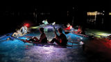 A night tour with I Can See Clear Kayaking Tours in the Florida Keys lights up the bay bottom.