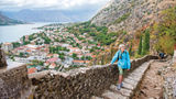 A woman in Kotor, Montenegro, travels solo with Overseas Adventure Travel, which primarily caters to travelers over age 50.