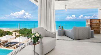A terrace at the Beach Enclave Grace Bay villa-resort. Beach Enclave Turks & Caicos says forward sales for 2023 are exceeding expectations.