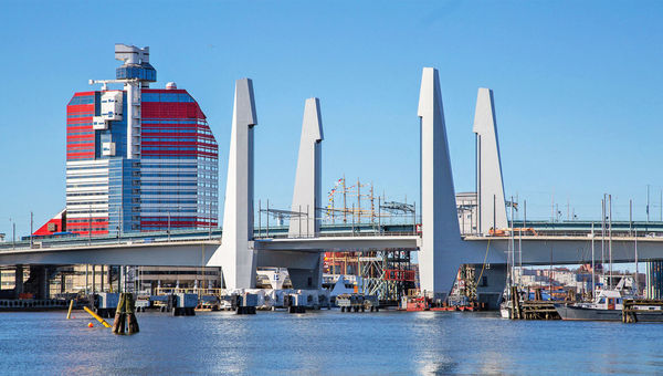 View of the Hisingsbron Bridge, distinguished by its vertical-lift span. The structure at left is known as the Lipstick building.